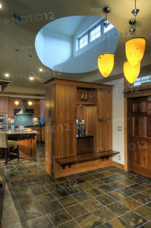 Cabinets and tiled floor in home entrance