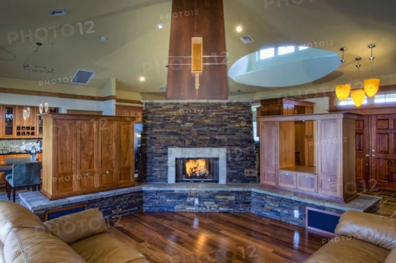 Traditional living room with stone fireplace