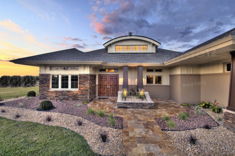 Front elevation custom home with landscaping