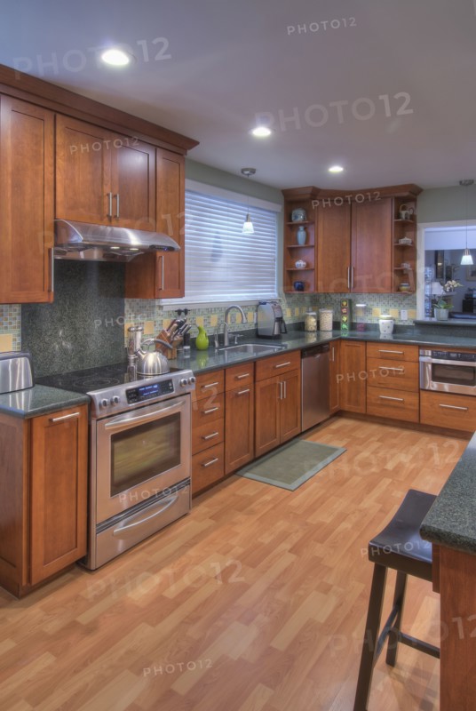 Kitchen counter with hardwood floor in contemporary house