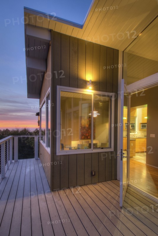 Balcony with floorboards in contemporary house