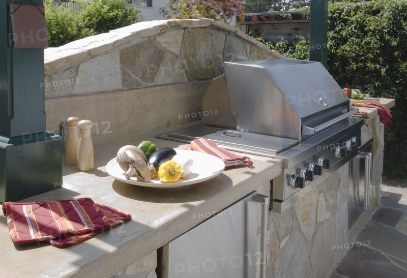 Outdoor grill and stone counter