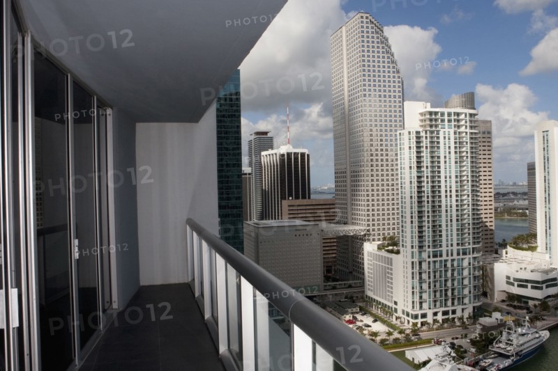 Balcony overlooking high rises in urban cityscape