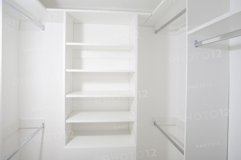 Empty shelves in walk-in closet