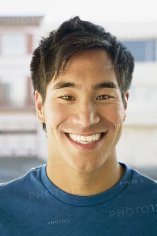 Close up of Asian man smiling