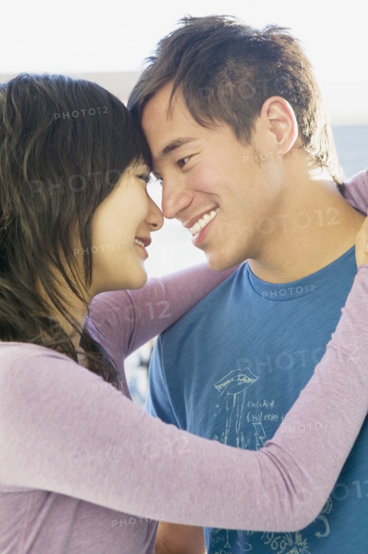 Asian couple hugging