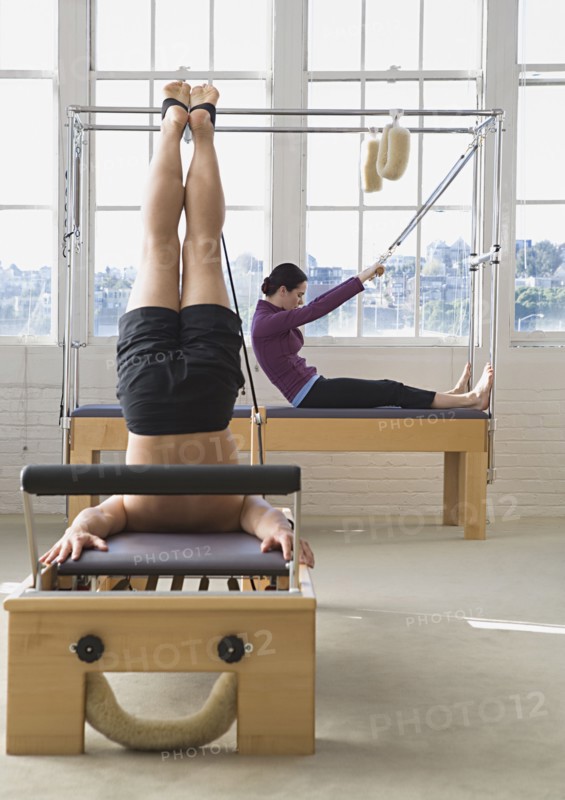 People stretching in exercise studio