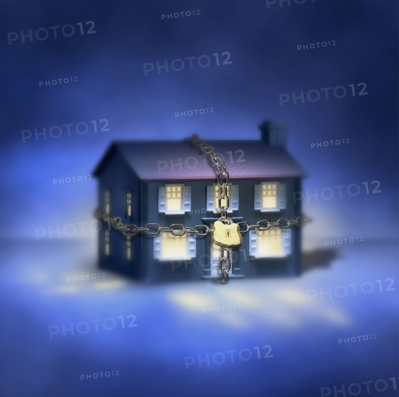 Illuminated house with chain and padlock