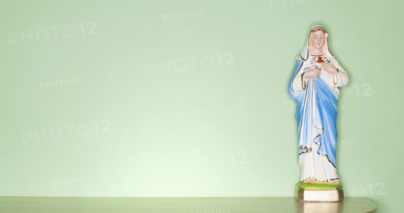 Religious figurine on counter top
