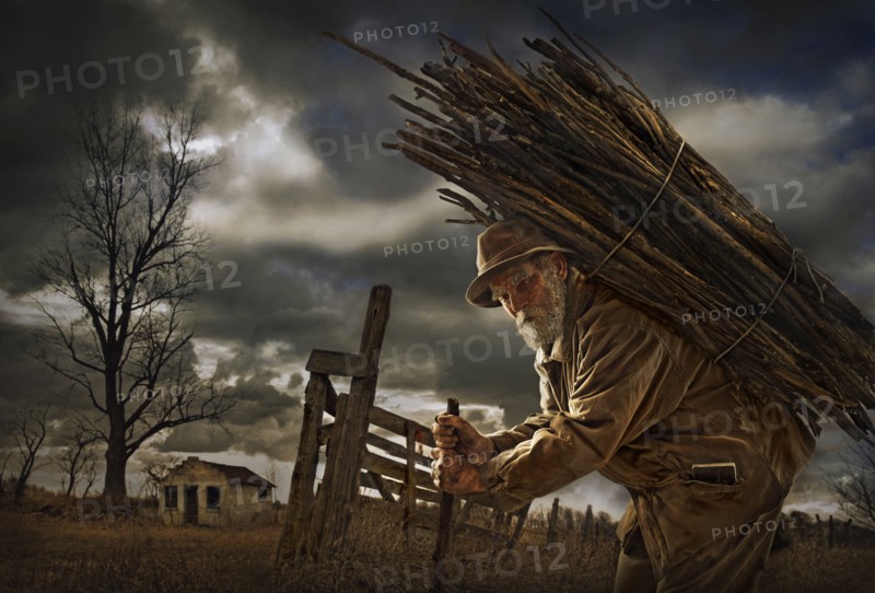 Illustration of Caucasian man carrying wood bundle on back