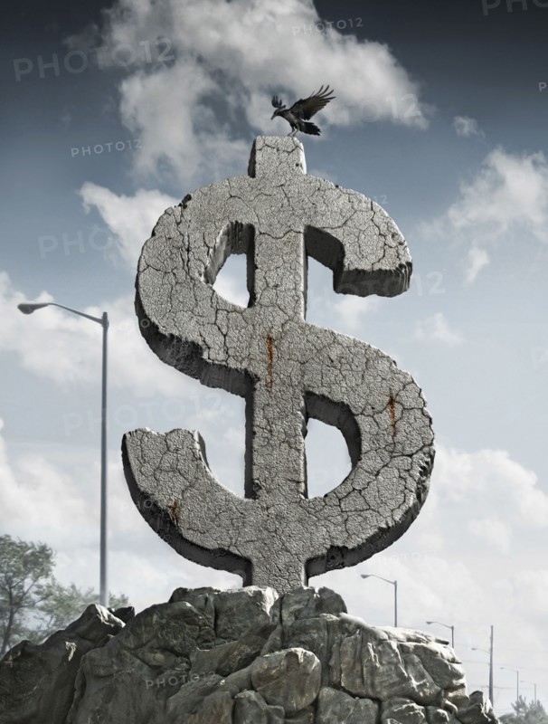 Bird landing on carved stone dollar sign