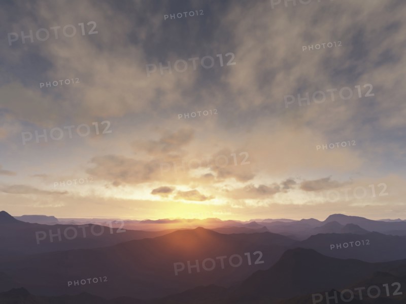 Sun rising over rural mountains