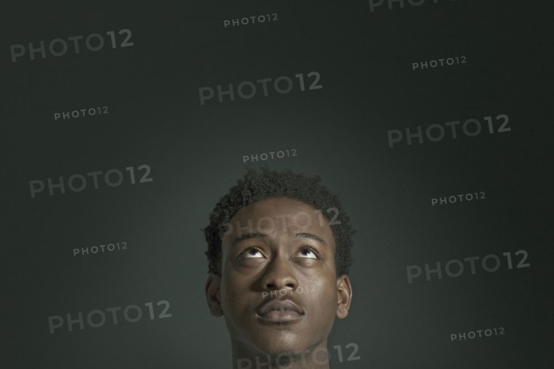 African American man looking up