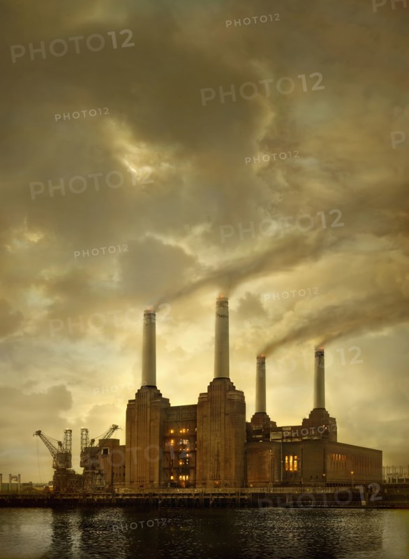 Smoke billowing from factory smokestacks