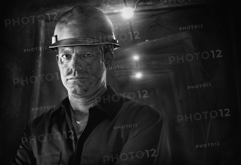 Caucasian carpenter wearing hard hat
