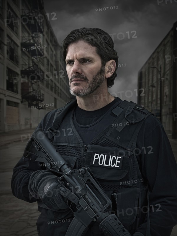 Caucasian policeman on city street