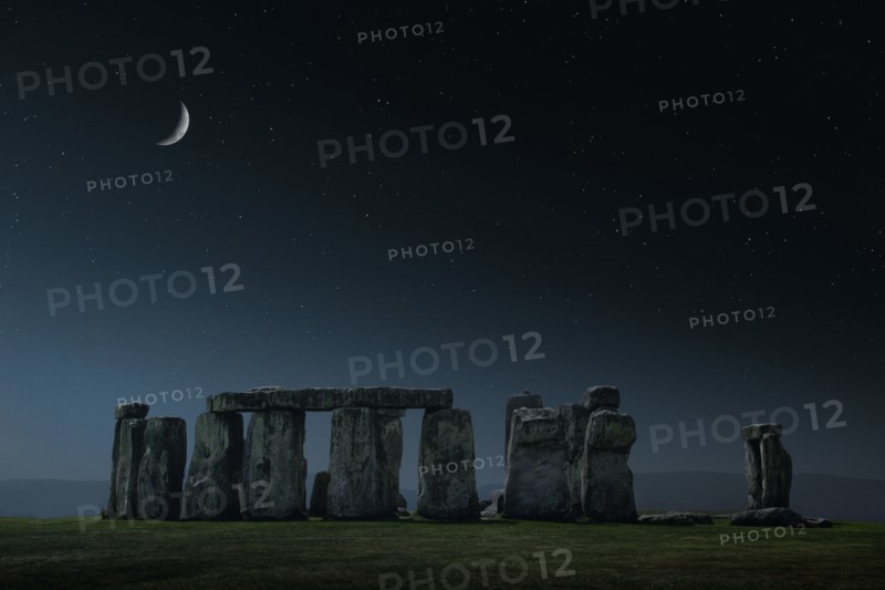 Crescent moon over Stonehenge monument
