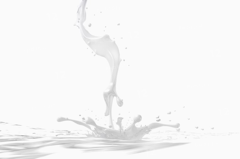 Milk stream splashing into pool
