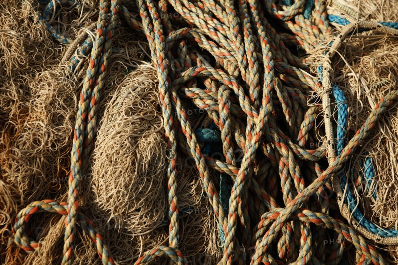 Ropes stacked on hay