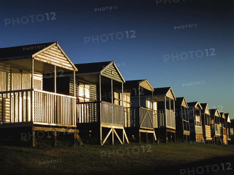 Wooden beach huts in a row