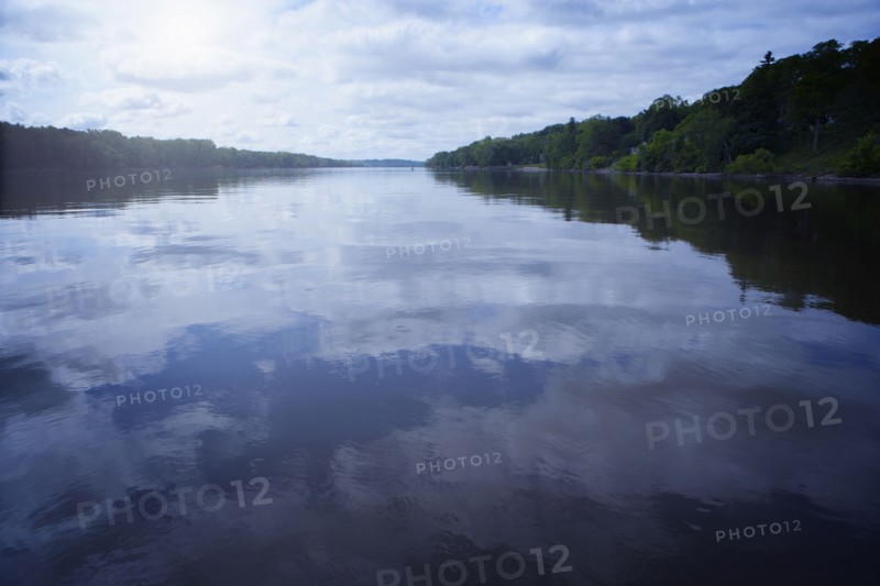 Clouds reflected in still lake