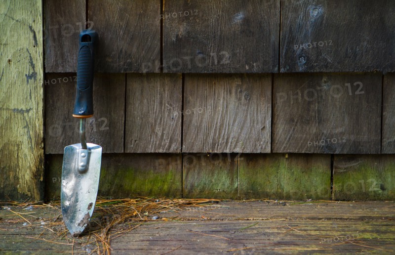 Close up of trowel outside house