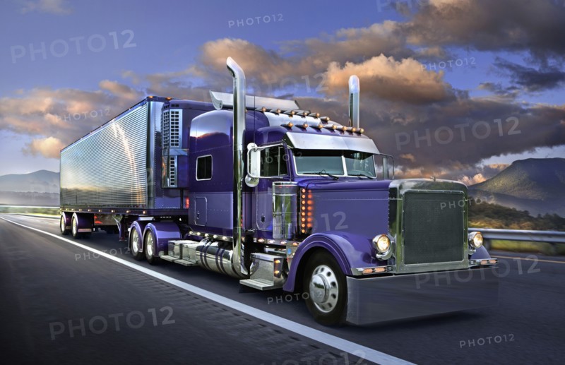 Semi truck driving on freeway