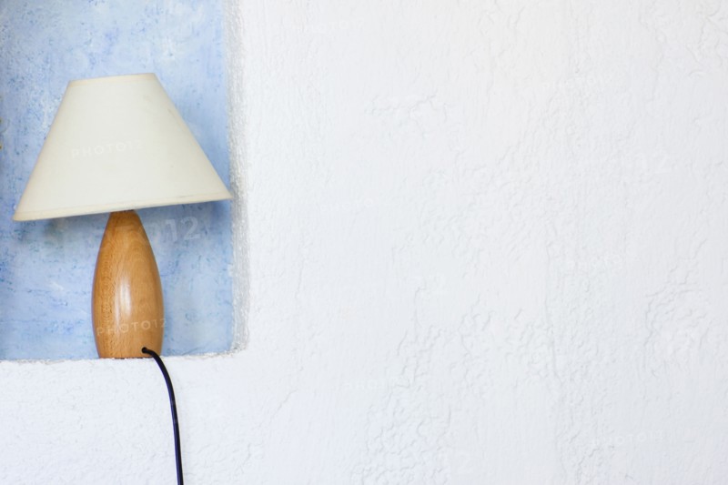 Close up of lamp in wall sconce