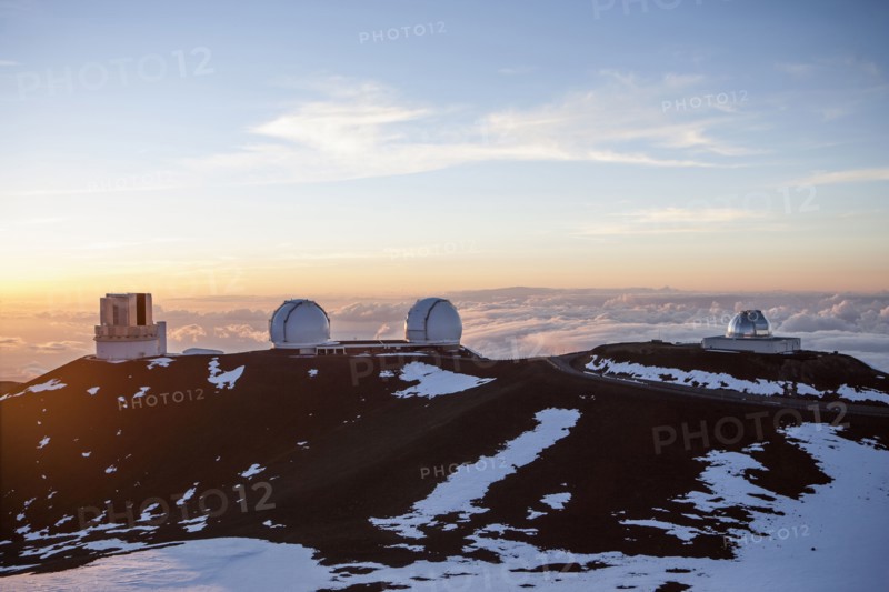 Observatory and silos on snowy mountaintop