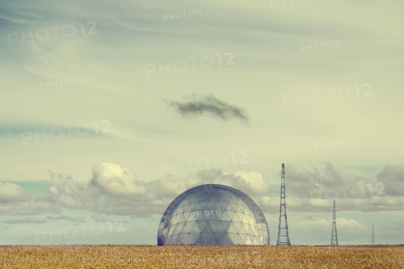 Observatory under cloudy sky