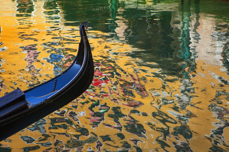 Close up of ornate gondola on canal