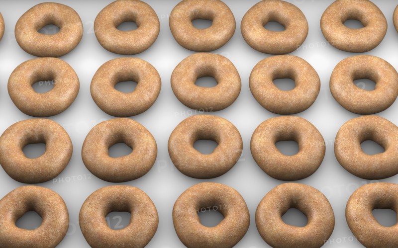 Close up of donuts on baking pan