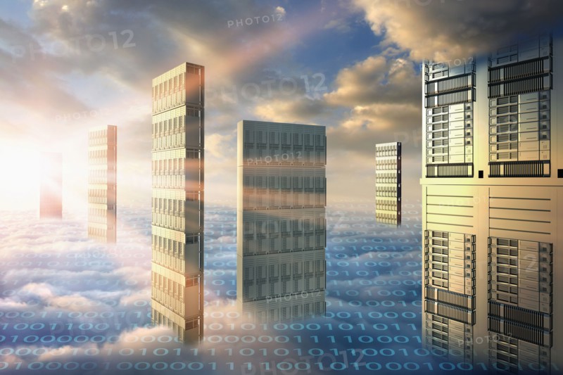 Computer servers in clouds with binary code
