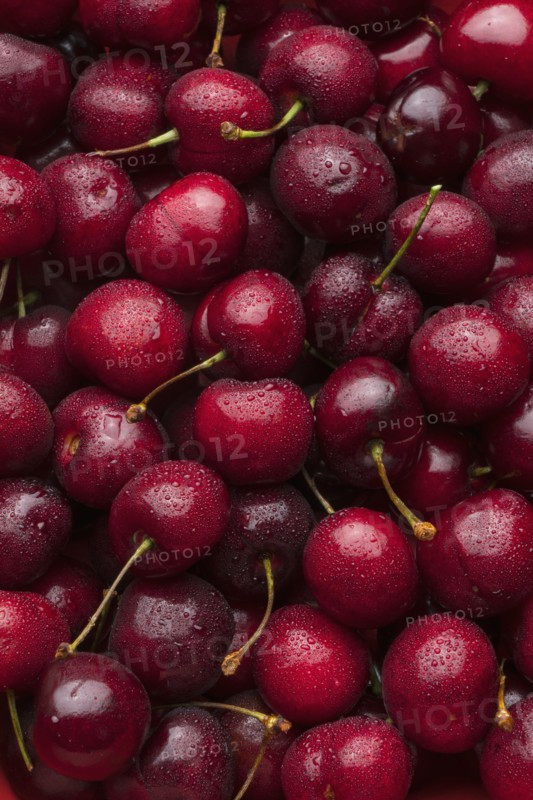 Pile of wet red cherries