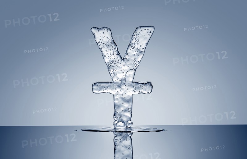 Puddle under melting ice yuan symbol