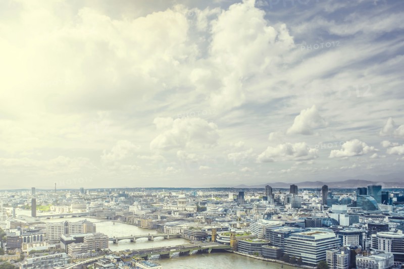 Clouds over river through city