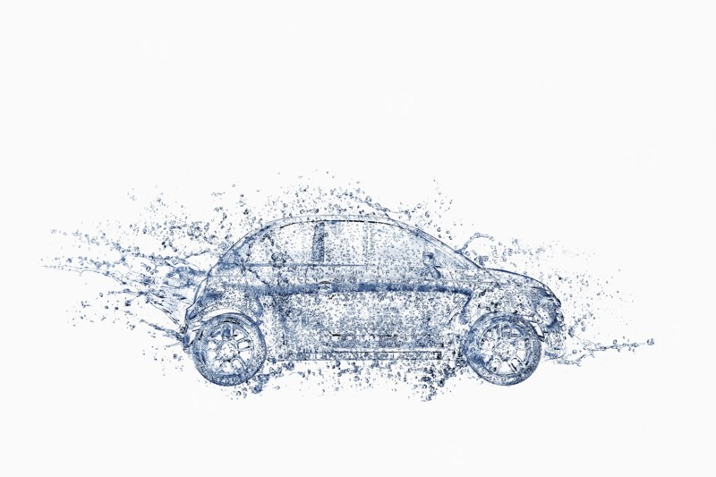 Splashing water droplets surrounding car