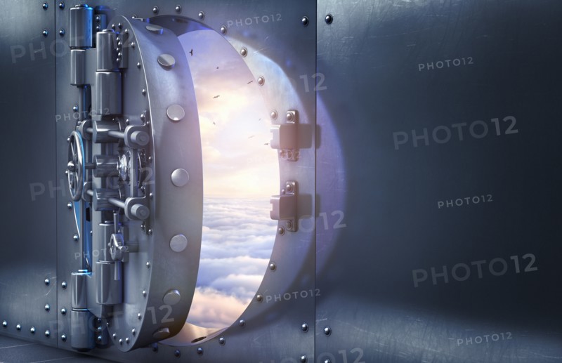 Open vault door revealing clouds in sky