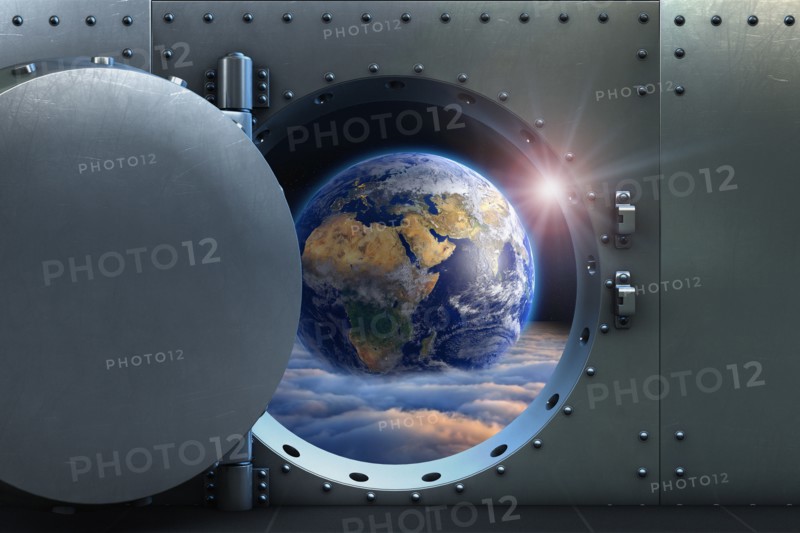 Open vault door revealing earth above clouds