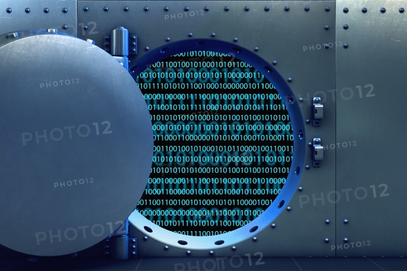 Open vault door revealing binary code