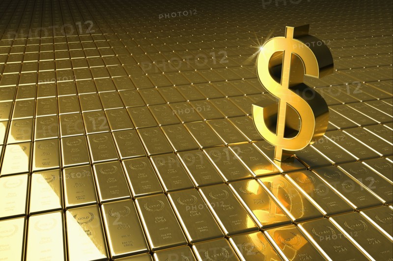 High angle view of gold bars and dollar symbol