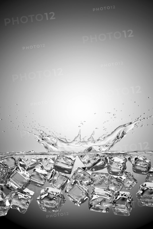 Ice cubes splashing into water and floating