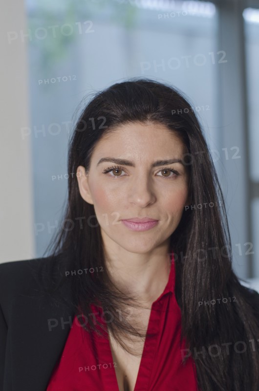 Serious Hispanic businesswoman