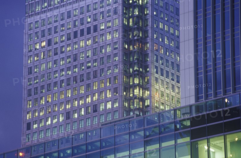 High rise office building illuminated at dusk