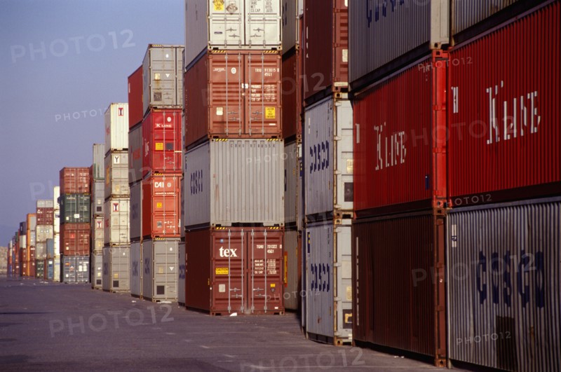Stacked Lines of Cargo Containers at a Docks