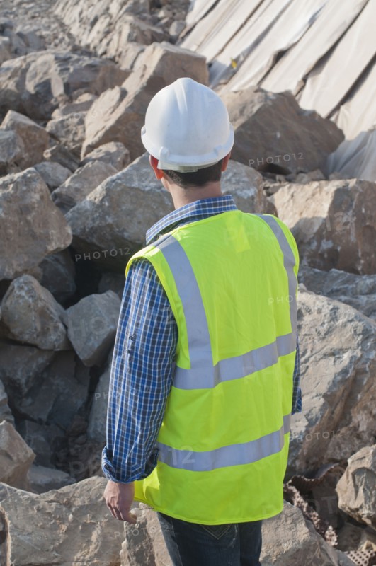rear view of engineer in construction site