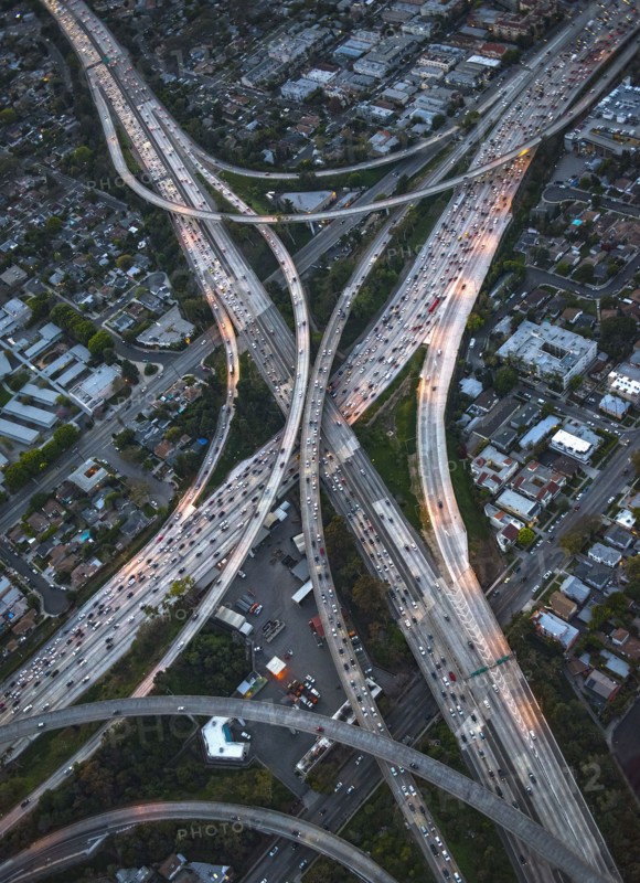 Aerial view of highway interchange in cityscape