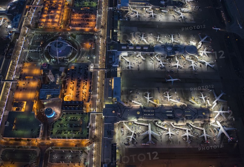 Aerial view of airplanes parked in airport gates