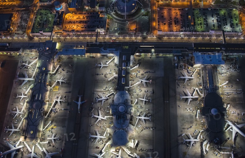 Aerial view of airplanes parked in airport gates
