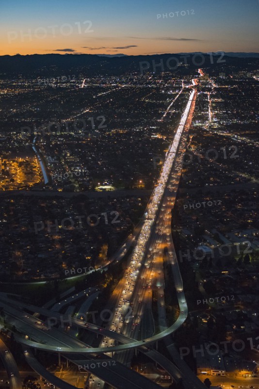 Aerial view of highway in Los Angeles cityscape